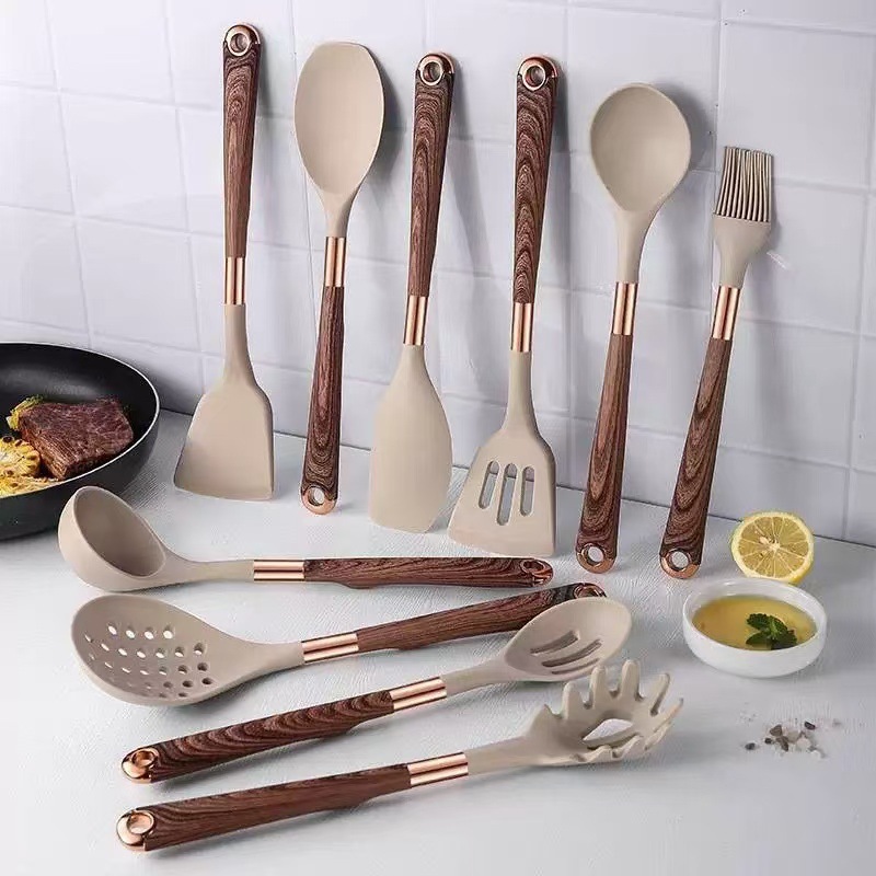 Nuevo conjunto de cocina de silicona transfronteriza 11 piezas de mango de madera chapado en oro no pegajoso de silicona 10 piezas en stock