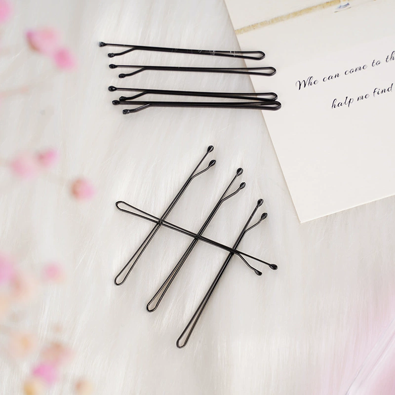 Black hairgrip, hair accessory