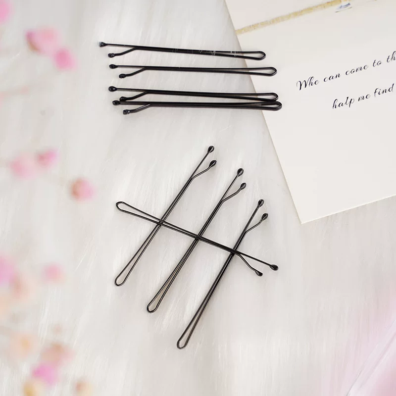 Black hairgrip, hair accessory