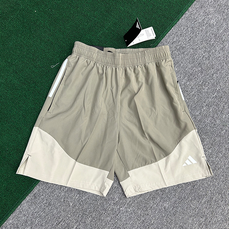 Fabricantes al por mayor de pantalones cortos deportivos para hombres de velocidad de hielo seco maratón de verano delgado entrenamiento de acondicionamiento físico panty