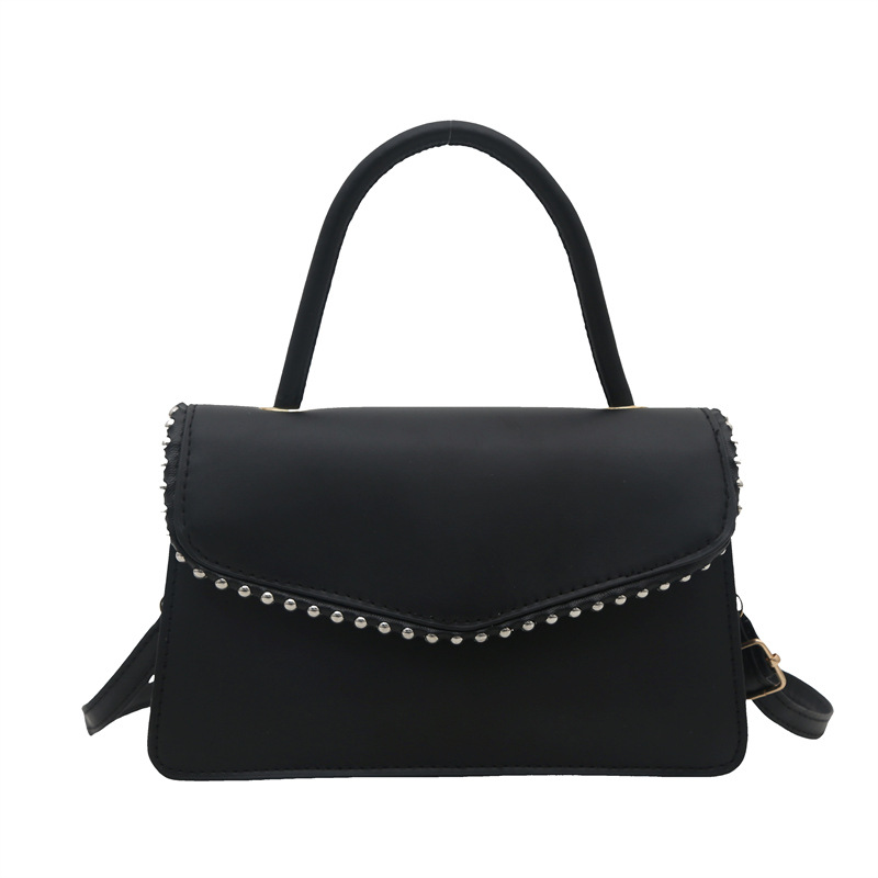 Bolso de hombro de aire extranjero para mujeres 2025 primavera nueva moda coreana portátil de color sólido simple bolso de tendencia