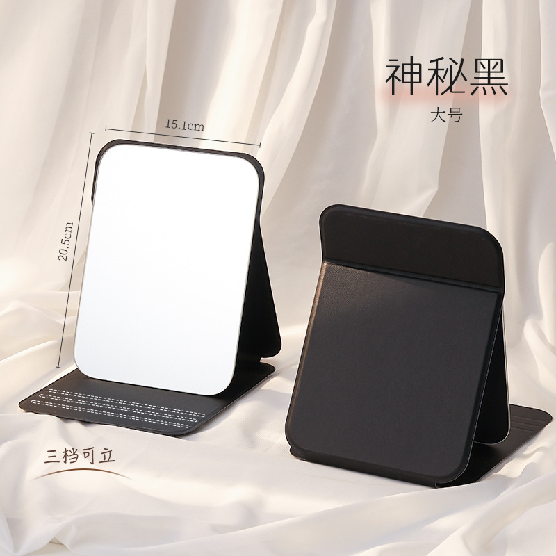 Espejo de maquillaje portátil de viaje de mujer plegable pequeño espejo de mano dormitorio de estudiantes espejo plegable mini espejo para hombre