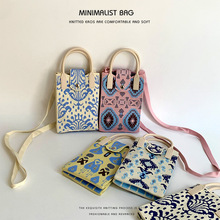 新款2025新疆艾德莱斯花纹手机包包印花民族风斜跨便携旅游手拎包