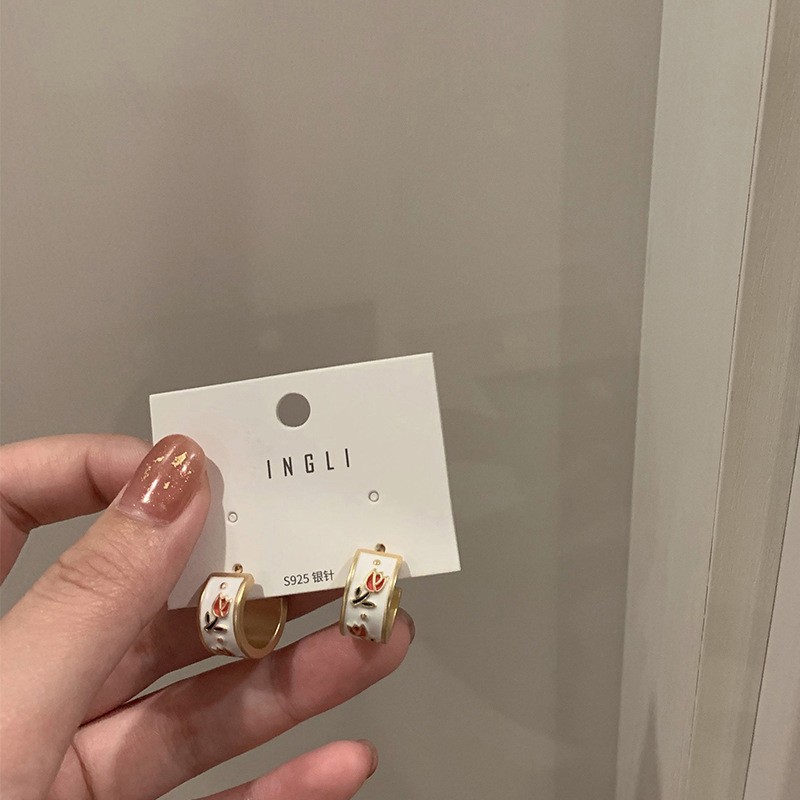 Aguja de plata flor pendientes geométricos pendientes dulces pequeños frescos de Corea del Sur ins moda nicho pendientes