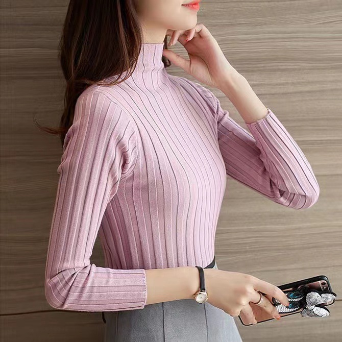 日本式のレースの半高襟のセーターの底のシャツの女性の秋冬の修身の中に白い上着を掛けます。