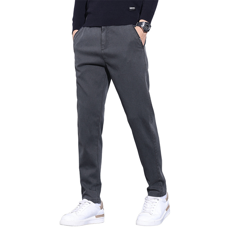 Pantalones juveniles populares para hombres casuales Otoño e Invierno nuevos pantalones antiarrugas resistentes al desgaste pantalones de todos los partidos juveniles elásticos pantalones casuales cómodos