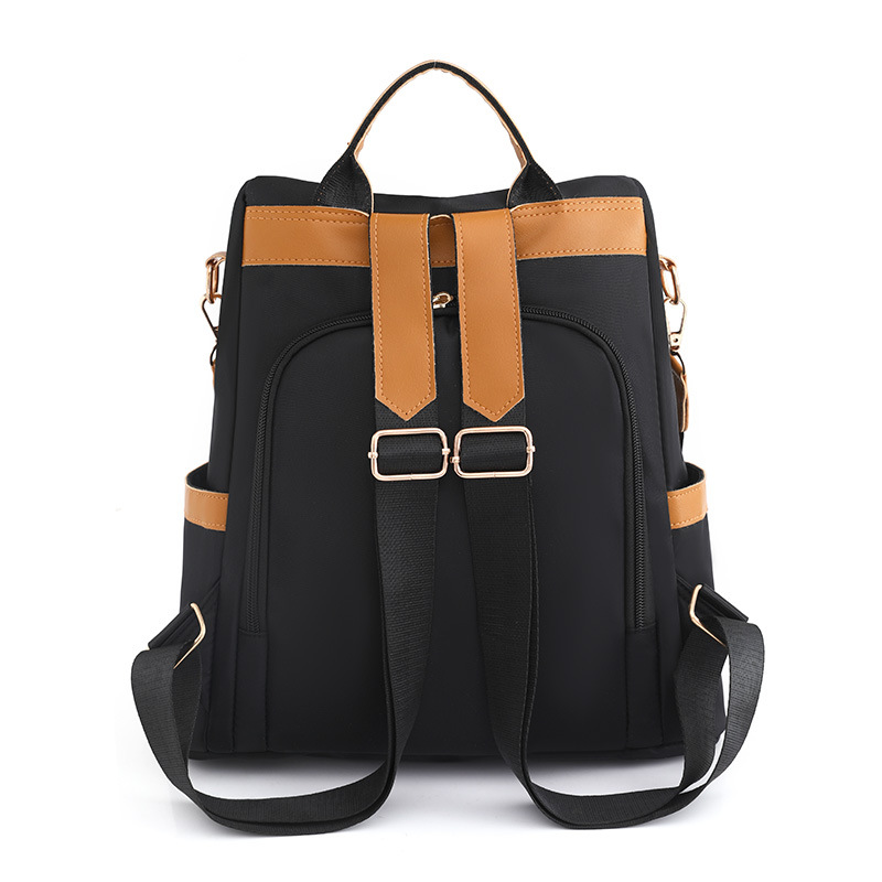 Comercio exterior al por mayor 2023 nueva mochila antirrobo casual para mujer moda contraste color viaje al aire libre mochila de doble uso marea