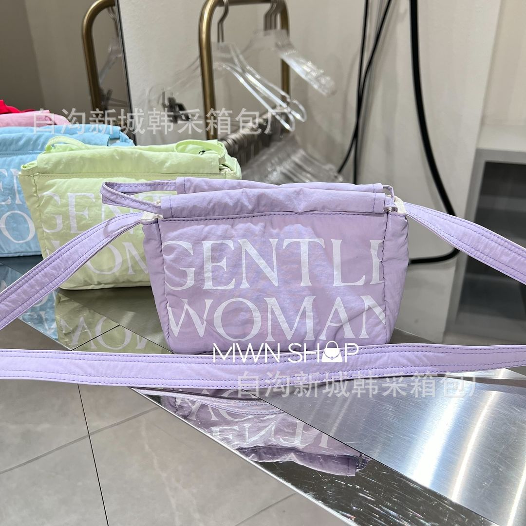 Diseño de nicho de mini albóndigas de la marca tailandesa de moda Gentle Woman 2024 nuevo bolso de hombro con cuerda de extracción