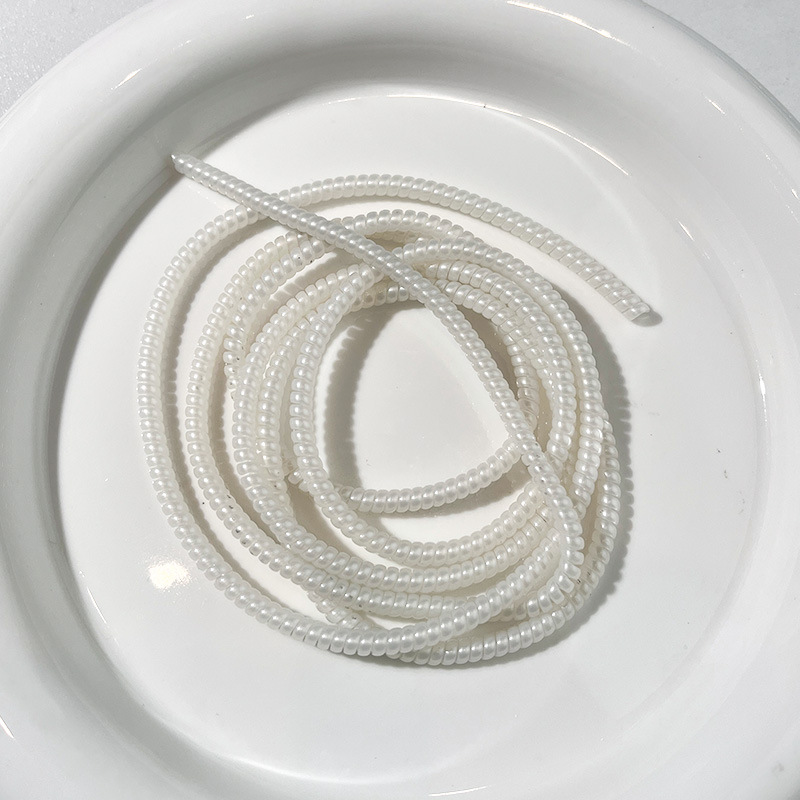 1.4 Cuerdas de protección de cable de datos de metro cuerda de protección de cable de carga de hilo de perla cubierta de protección de cable de protección anti-ruptura en stock