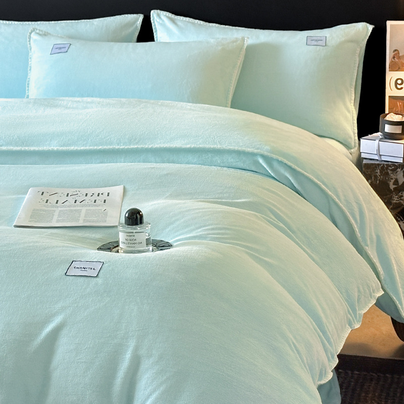Invierno más cama de lana de cuatro piezas conjunto 2025 nueva cama de lana de leche gruesa sábanas de lana de coral cubierta de colcha de tres piezas