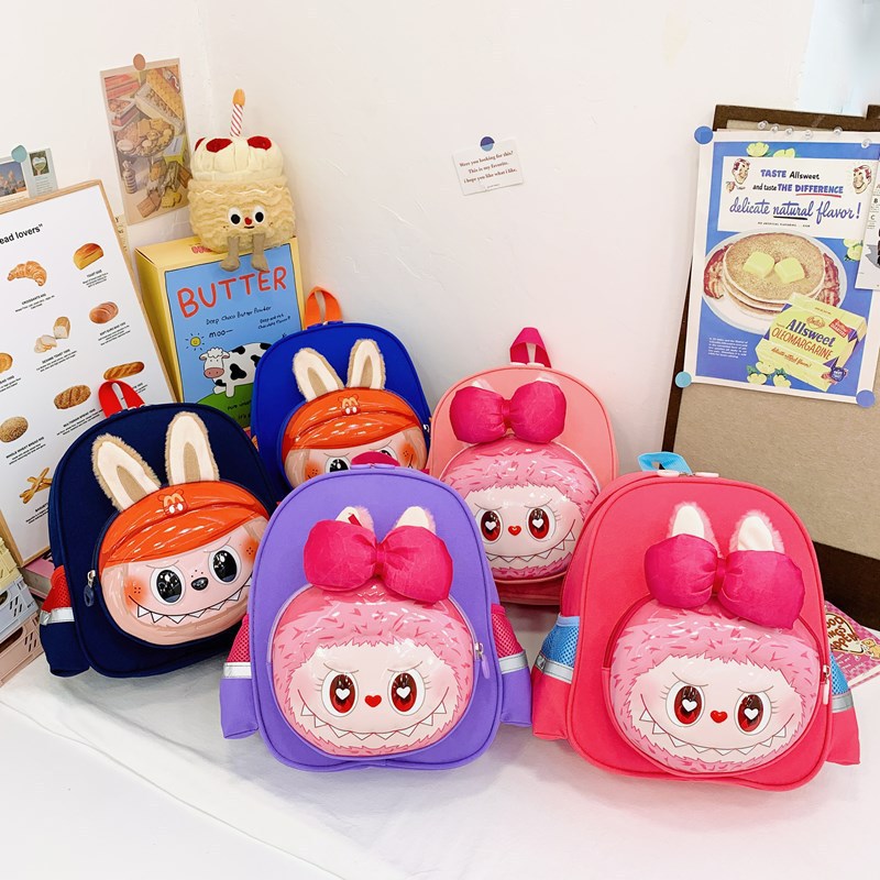 Nueva moda guardería mochila de alta calidad lienzo de dibujos animados tendencia casual lindo extraño mochila de hombro para niños