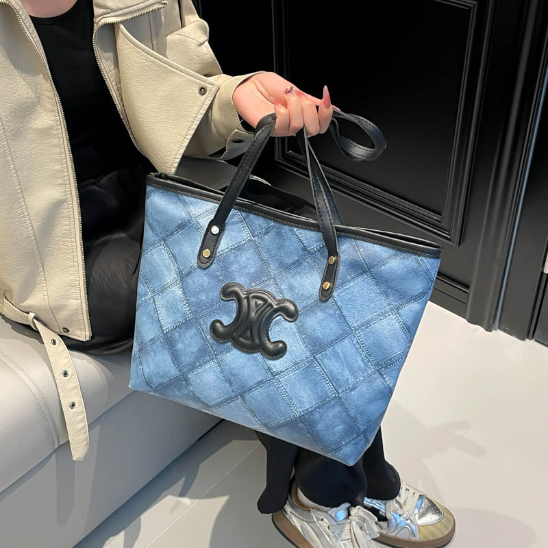 Bolsa de mano transfronteriza de gran capacidad para mujeres 2025, nueva sensación de alta calidad, bolso de hombro de viaje universal, bolso de moda