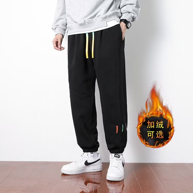 Primavera y otoño 2024 nuevos pantalones casuales para hombres, pantalones deportivos sueltos de la marca de moda juvenil, pantalones deportivos sueltos de color sólido