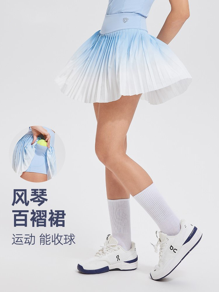 Falda de cintura alta de gradiente anti-exposición de dos piezas falsa delgada de verano deportes profesionales Falda plisada de fitness transpirable de secado rápido