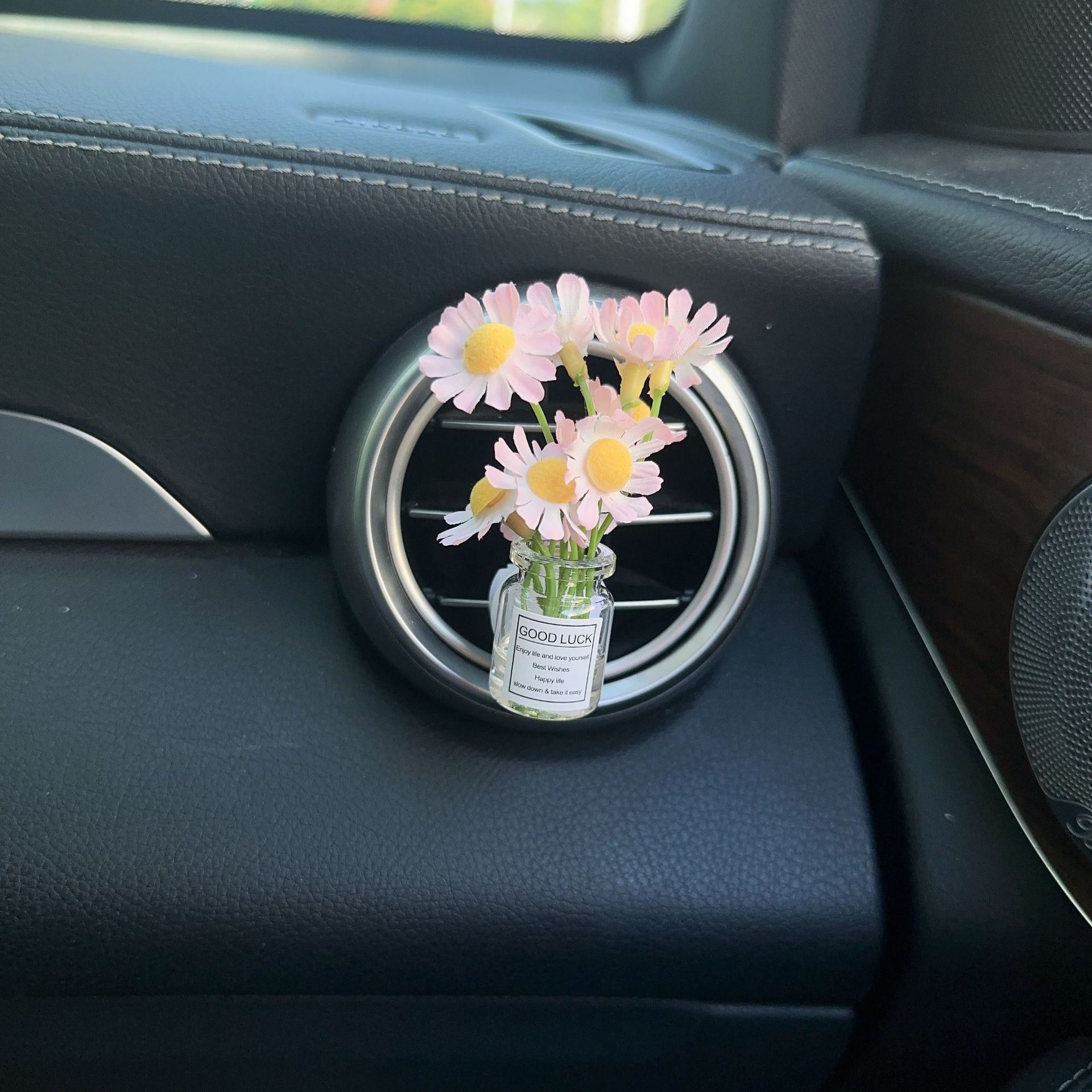Decoración creativa de salida de aire del automóvil con flores de estrellas pequeñas frescas aire acondicionado botella de perfume de perfumes