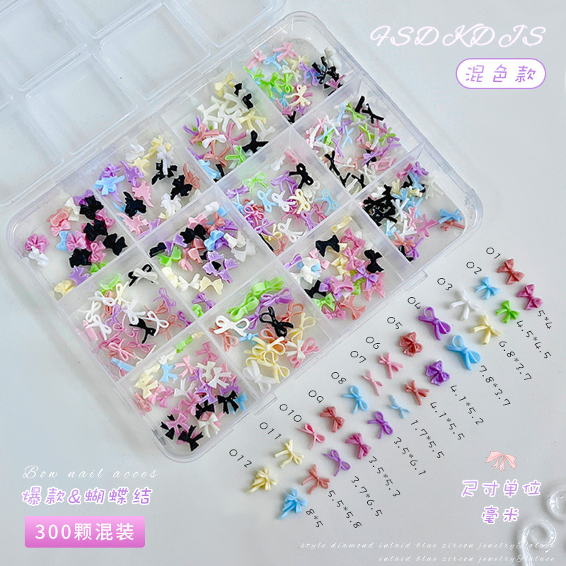 12 cuadros mini bowknot accesorios de uñas tamaño mixto estilo explosivo transfronterizo blanco y negro pajarita rosa accesorios de diamantes de uñas
