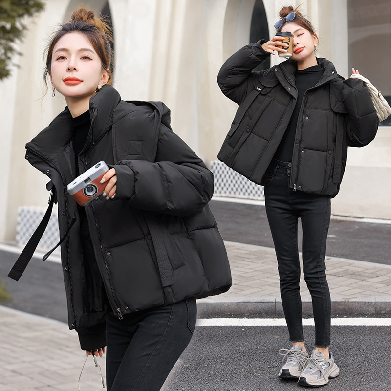 Corea del Sur Dongdamen ropa de algodón de pluma para mujeres corto 2025 invierno nuevo algodón delgado chaqueta con capuz transfronteriza