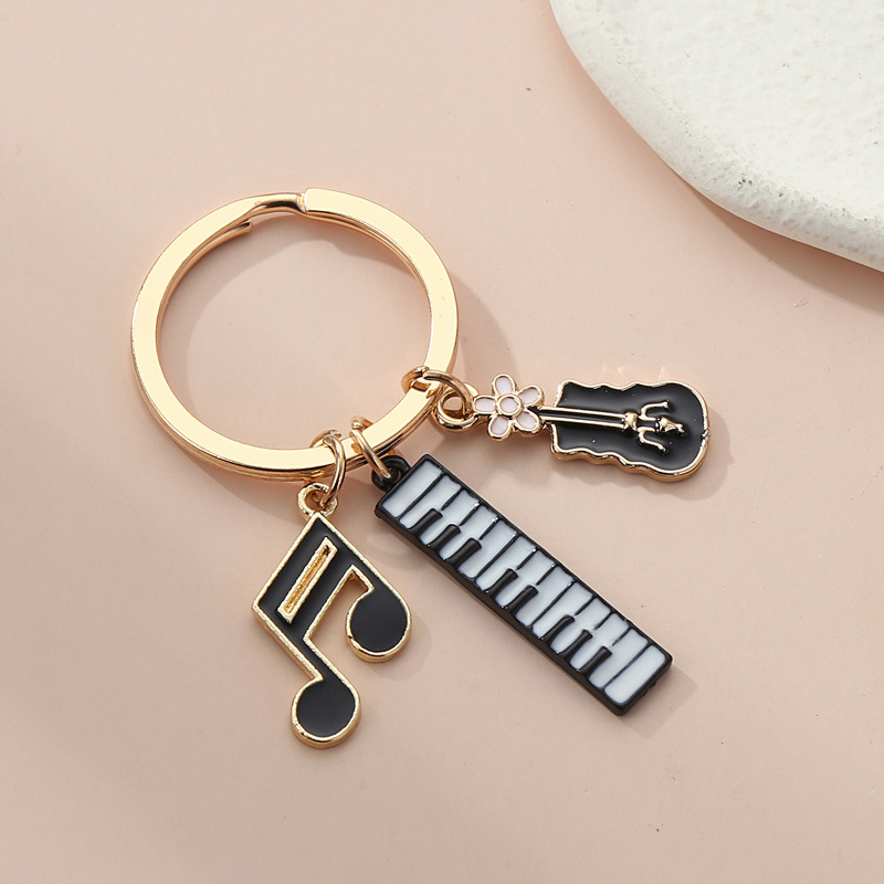 Llavero colgante de instrumento musical con diseño de teclado de violín estilo Chanel, superventas transfronterizo, venta directa de fábrica de Amazon image 12