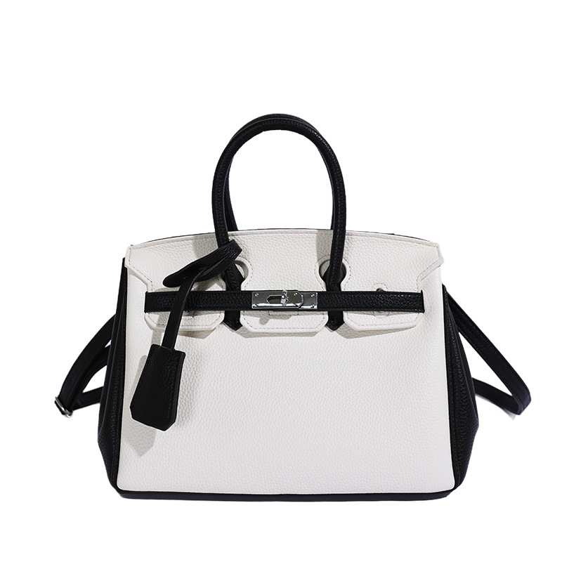 Bolso de platino portátil de litchi para mujeres 2026 comercio exterior nuevo estilo de alto nivel de sensación de tamaño de estilo de hombro mochila