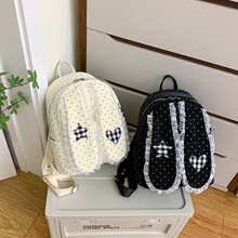韩版新款波点兔耳朵双肩包逛街蕾丝边女孩背包轻便大容量学生书包