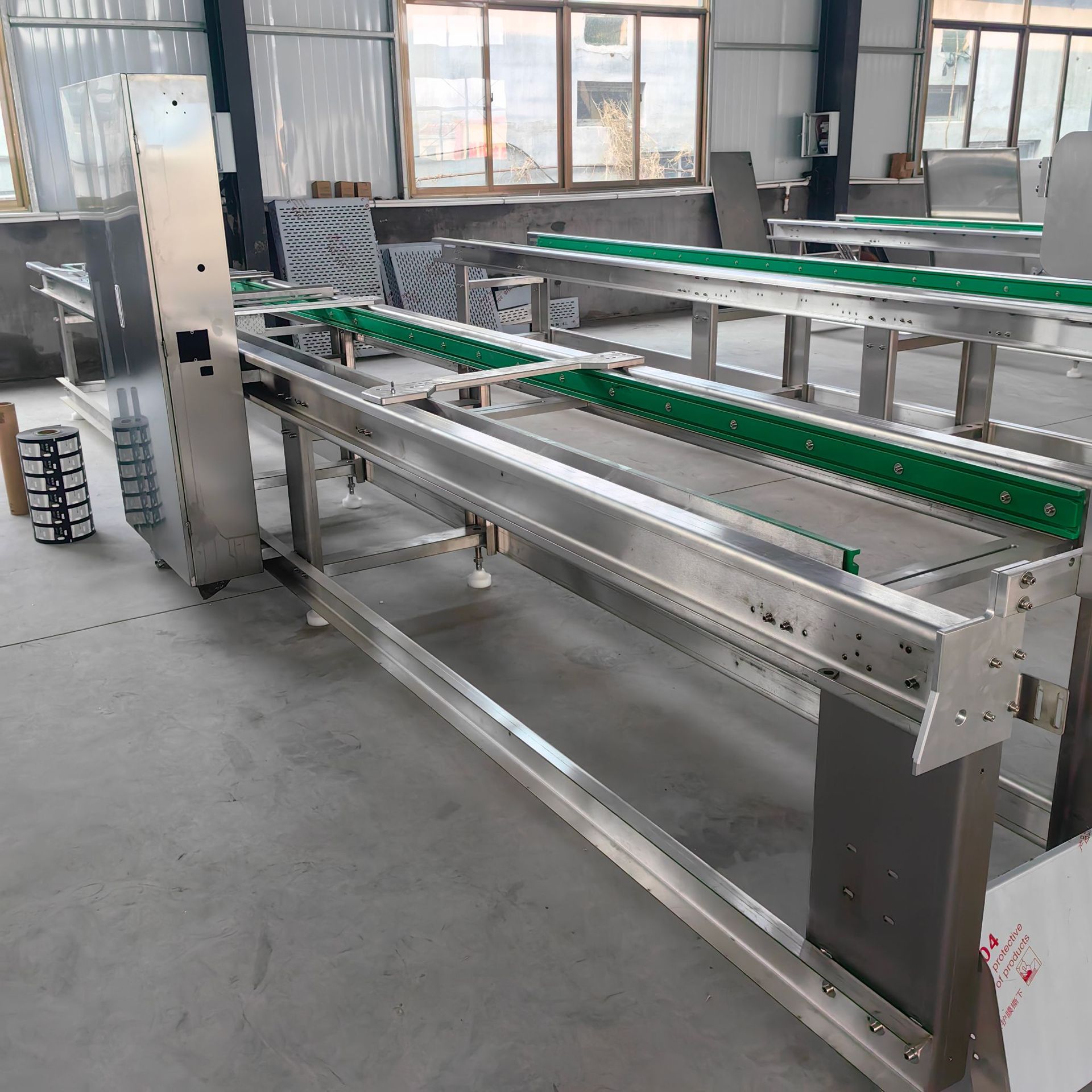 全自动连续拉伸膜真空包装机大型工业商用流水线真空封口机厂家