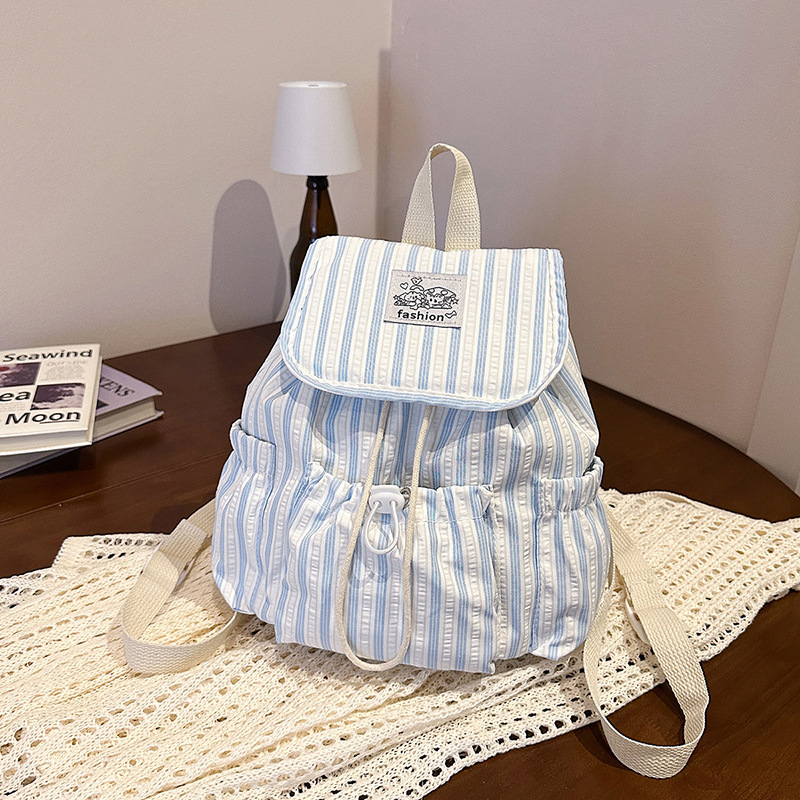 Coreano de alto valor, mochila a rayas, mochila de viajes ocio, mochila al aire libre, mochila fresca.