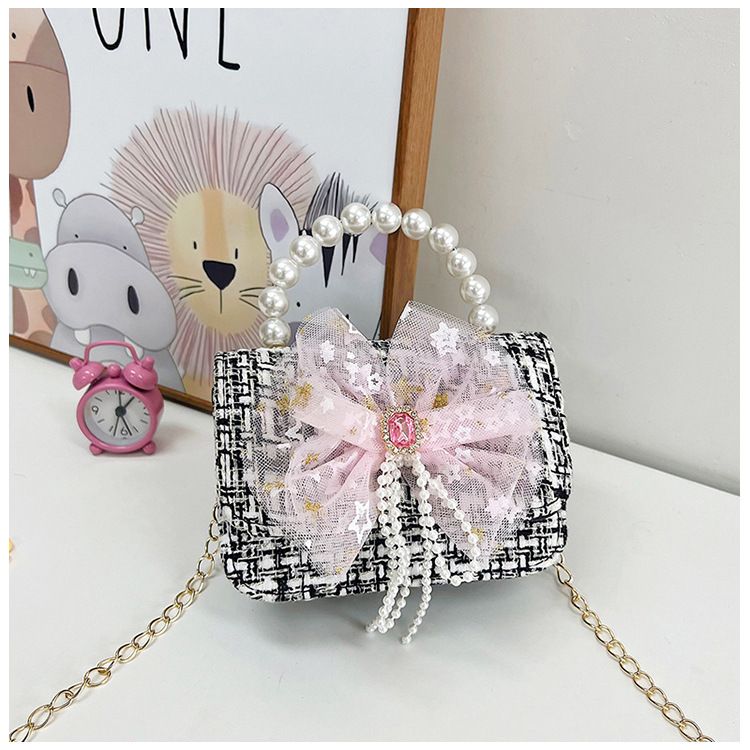 Nuevo bolso de los niños estilo chanel bolso de hombro de la manera del todo-fósforo de las niñas bolsa de mensajero de moda cadena accesorios bolsa al por mayor