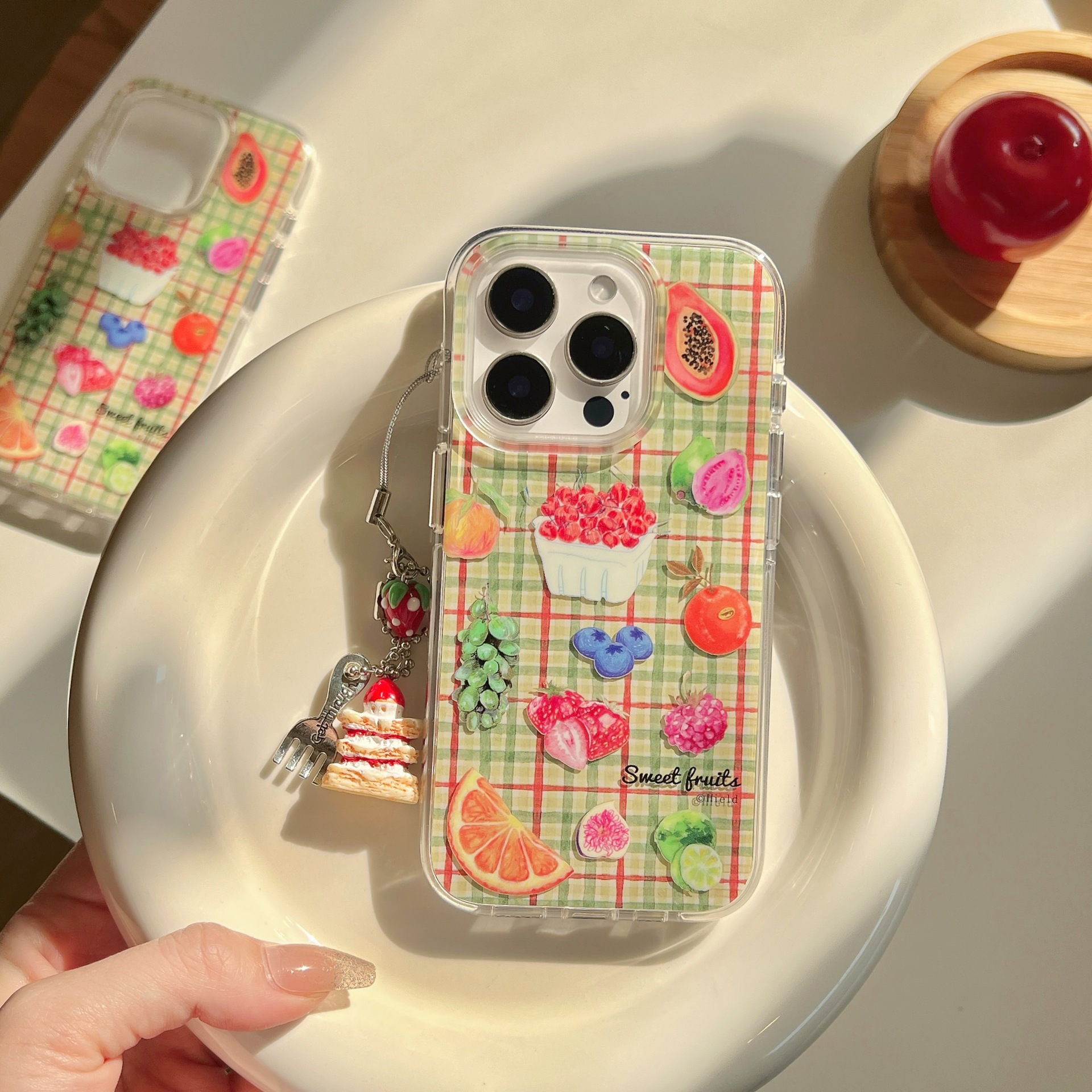 La fruta a cuadros de color de nicho es adecuada para Apple 15/16 funda para teléfono móvil 14Pro colgante 13 verano 16ProMax mujer