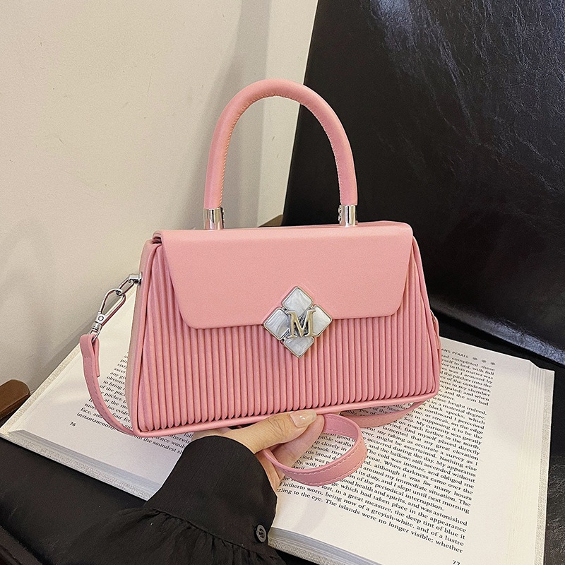 Bolso de textura transfronteriza 2025 verano nuevo bolso femenino moda bolso de hombro a rayas transmisión en vivo del mismo estilo bolso de mensajero marea