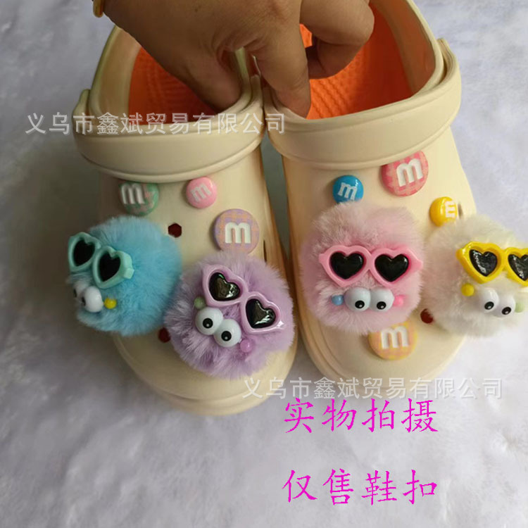 Muñeca de dibujos animados felpa estrella Delu agujero zapatos accesorios piel bola creativa nuevos zapatos decorativos hebilla agujero zapatos Accesorios