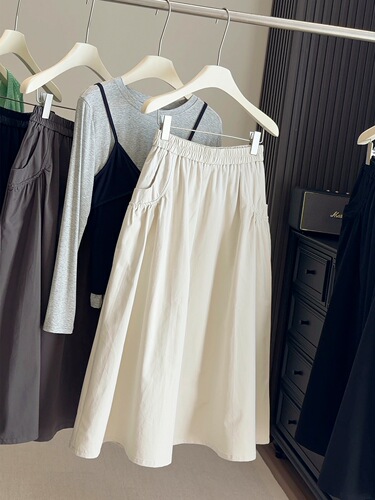 2026 spring and autumn new style elastic waist loose pocket skirt for women with high waist a-line skirt large swing medium and long umbrella skirt