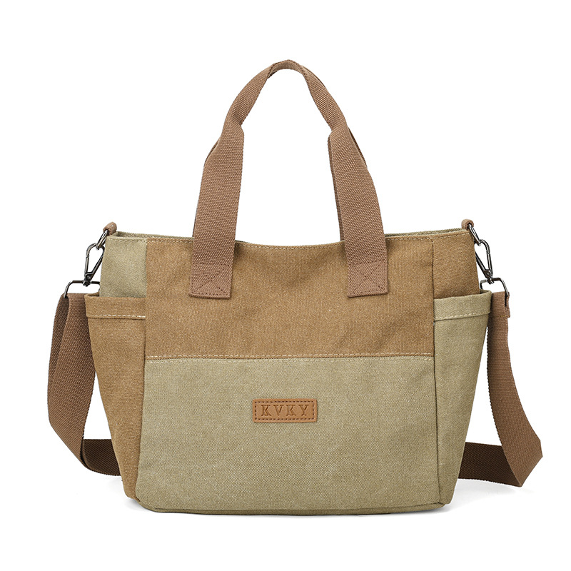 2026 bolsas de lona para mujeres nuevas bolsas de mochila casuales TOT con estilo coreano simple y gran capacidad bolsas de hombro