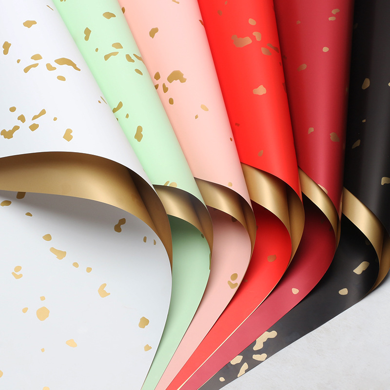 Flores de flores de papel de oro de oro de papel de embalaje de flores comercio exterior al por mayor materiales de flores impermeables floristas de paquetes de papel