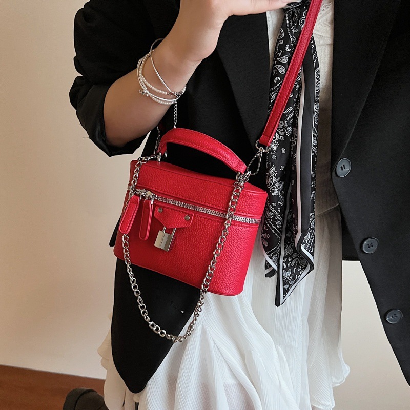 Bolso de cubo de moda coreana 2025 verano nuevo bolso de hombro con patrón de lichi bolso de mensajero de cadena de moda mujer