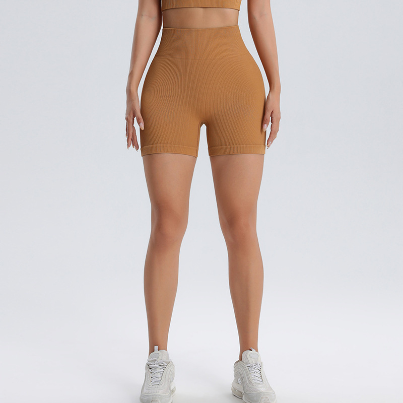 Europa y Estados Unidos deportes transfronterizos fitness yoga pantalones cortos transpirables transpiración de sudor melocotón elevación de cadera alta elástica secado rápido cintura alta apretada mujer