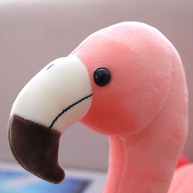 Nuevo ins Flamingo juguete de peluche almohada de dibujos animados muñeca máquina muñeca de juguete para niños con logo