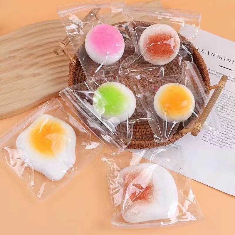 Bollos de descompresión de simulación transfronteriza, hojaldre de yema de huevo fluido, ventile, hamburguesa, taza de ardilla, descompresión, rebote lento, pellizco