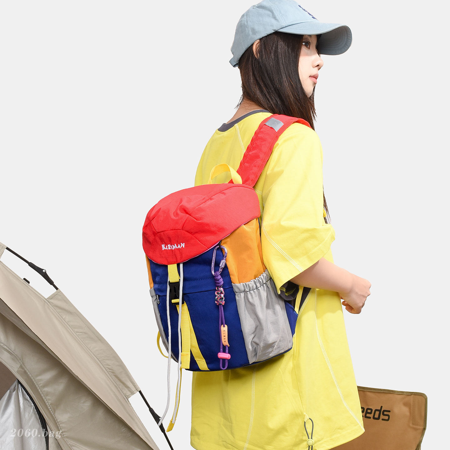 Mochila escolar impermeable estudiantes de viento color empalme ligero al aire libre nueva 2026 mochila de viaje mochila de gran capacidad