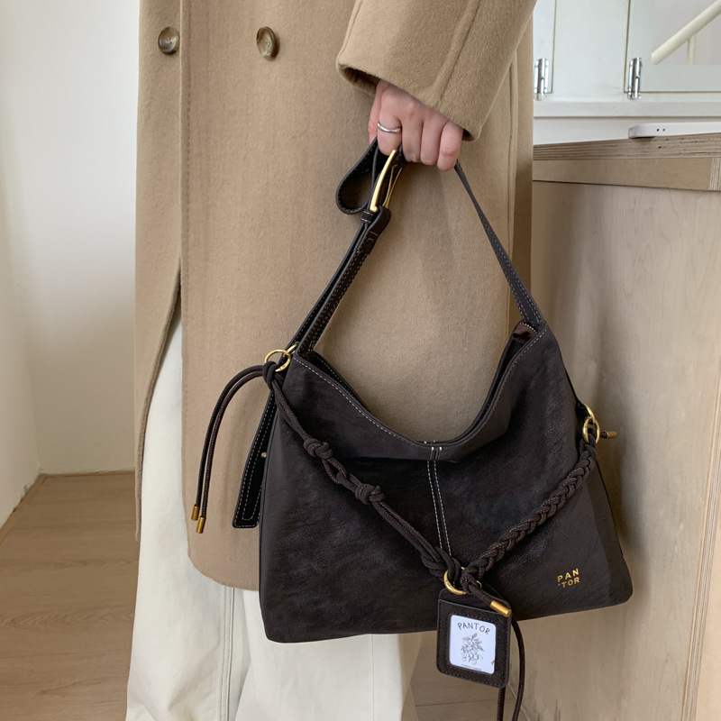 Bolso retro de gran capacidad para mujeres invierno 2025 nuevo estilo de moda alta sensación de bolso especial bolso de balde de agua de invierno
