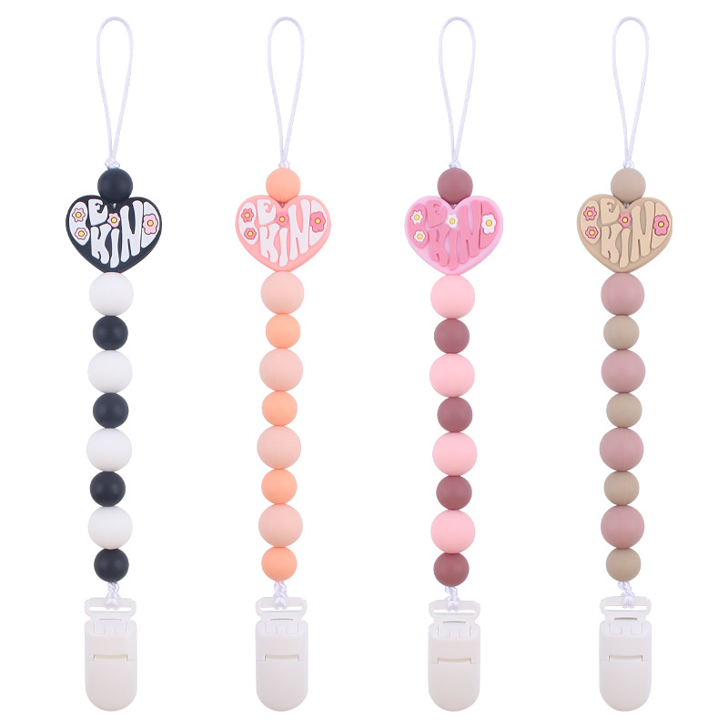 Nuevo bebé suministros de dibujos animados amor mordedor creativo DIY bebé mordedura de silicona Cadena de pezón cadena anti-caída