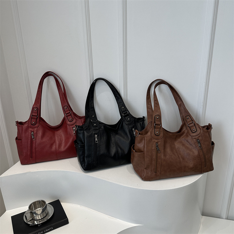 Bolso retro de gran capacidad 2025, nueva textura de moda para viajar bolso de mujer, viaje corto, mochila