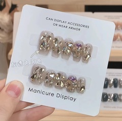 Pandora, the heiress of a wealthy family, sparkles with champagne diamond manicure in spring, revealing fair and translucent grey in autumn and winter, handmade wearable nail wholesale.