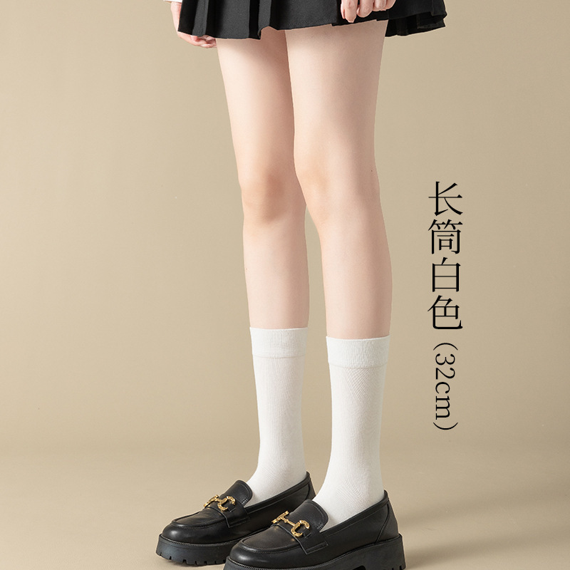 Calcetines de pantorrilla Calcetines de algodón puro de primavera y verano para mujer Calcetines de tubo jk de tubo de estufa de presión para niños Calcetines por encima de la rodilla en blanco y negro Calcetines Zhuji al por mayor