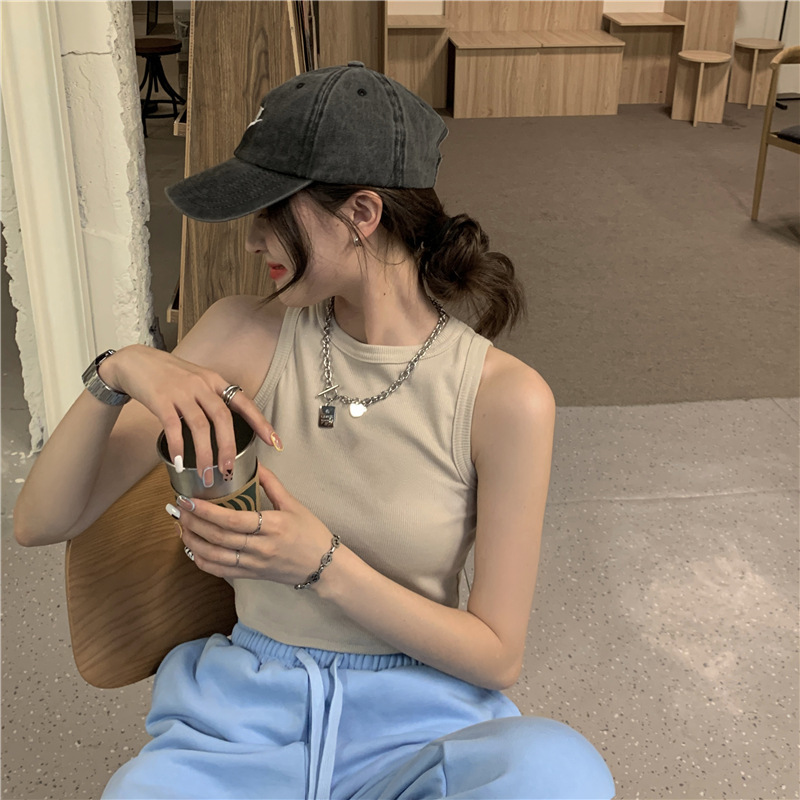 Top corto ajustado de cuello redondo estilo americano para exterior, camisola de verano 2025 nueva y moderna con un toque de diseño.
