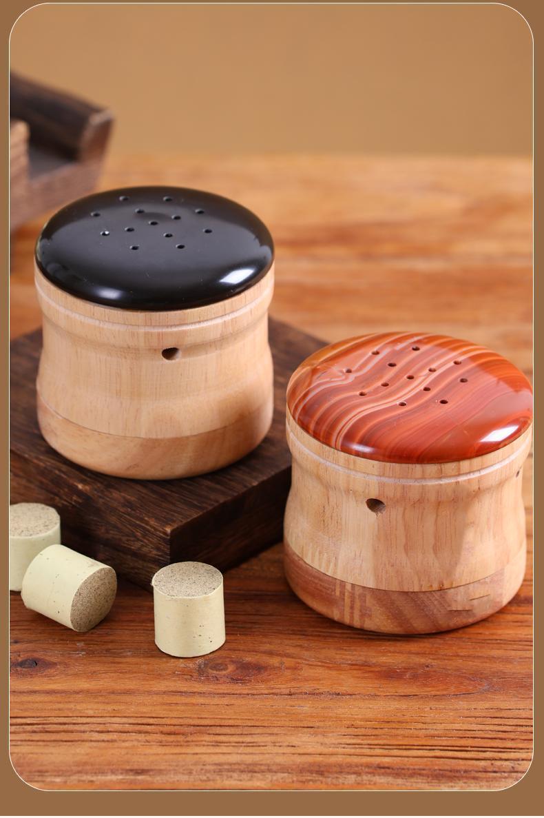 Peach Blossom Facial Moxibustion Tool Bian Stone Moxa Jar Warm Therapy Device with 10ml Mugwort Essential Oil in use