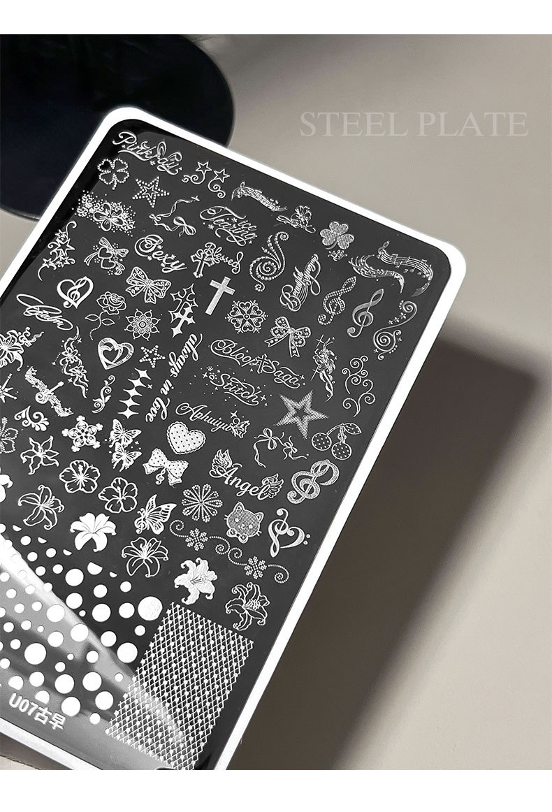 New vintage-style nail art stamping plates featuring musical notes, lilies, polka dots, and crosses – wholesale retro pattern transfer plates