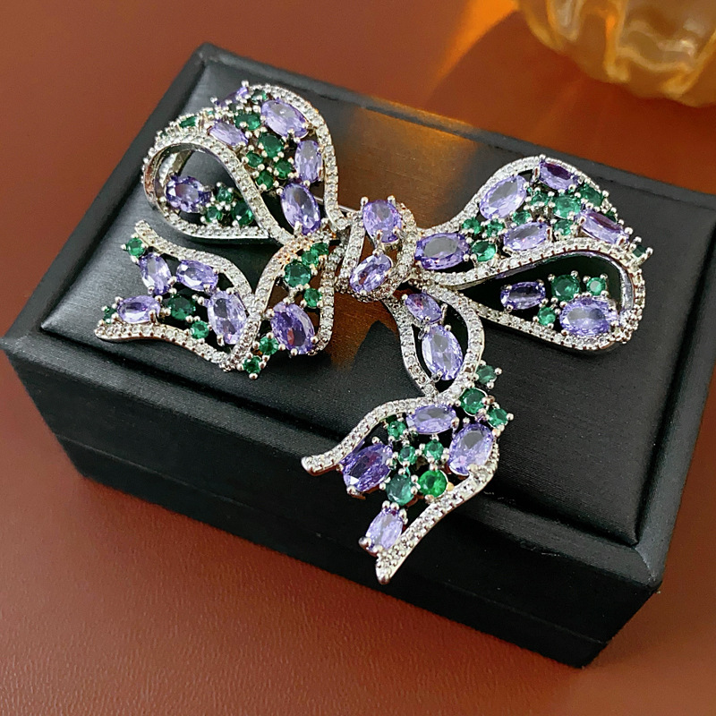 Broche de arco hueco brillante estilo lujoso ligero de alto nivel flor de pecho creativo de diseño francés accesorios de otoño y invierno mujeres image 7