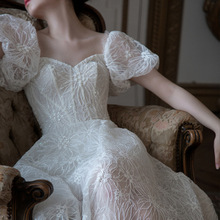 2022春夏新款蕾丝泡泡袖镂空白色连衣裙女名媛法式气质仙女长裙子