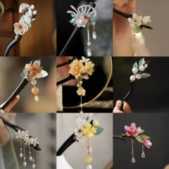 新しい中国の手作りの青い花のかんざしの国風のチャイナドレスの超仙のかんざしの女性の高級感の流蘇は木のかんざしを揺らします。