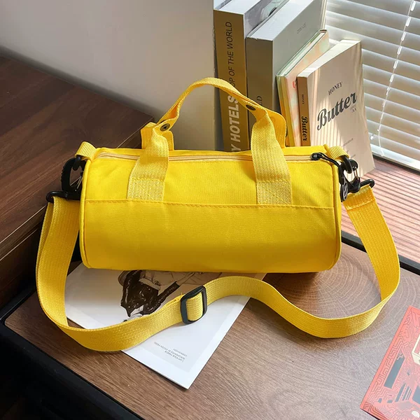 Cross-border cylindrical sports crossbody gym bag, textured portable lightweight travel bag, fashionable Oxford cloth leisure bag